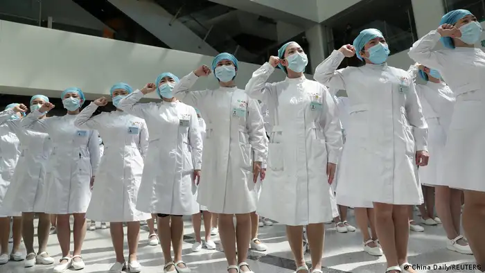 Nurses take part in an event held to mark the International Nurses Day in Wuhan