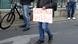 A protester in Berlin holds a sign saying "Corona is a psy op" A protester in Berlin holds a sign saying "Corona is a psy op"