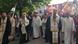 Serbian Orthodox priests and supporters walk down the street on May 12 Serbian Orthodox priests and supporters walk down the street on May 12