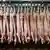 Закачени на куки разфасовани свине в германска кланица  
