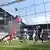 A view from behind the goal as John Anthony Brooks of Wolfsburg scores