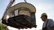 Deutschlands berühmtester Kiosk aus Bonner Republik am Kranhaken Deutschlands berühmtester Kiosk aus Bonner Republik am Kranhaken