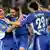Schalke's Edu celebrates with his Schalke teammates