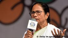 Indian Chief Minister of the eastern Indian state of West Bengal and the Trinamool Congress (TMC) supremo, Mamata Banerjee, speaks during an election campaign in Siliguri on April 13, 2019. - India's gargantuan election, the biggest in history, kicked off on April 11 with Prime Minister Narendra Modi seeking a second term from the South Asian behemoth's 900 million voters. (Photo by DIPTENDU DUTTA / AFP) (Photo credit should read DIPTENDU DUTTA/AFP via Getty Images)