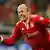 Munich's Arjen Robben celebrating his second goal on Saturday