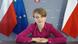 Jadwiga Emilewicz speaks with DW in a Skype call surrounded by Polish and EU flags Jadwiga Emilewicz speaks with DW in a Skype call surrounded by Polish and EU flags