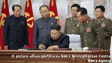 In this undated photo provided on Sunday, May 24, 2020, by the North Korean government, North Korean leader Kim Jong Un signs a document during a meeting of the Seventh Central Military Commission of the Workers' Party of Korea in North Korea. Independent journalists were not given access to cover the event depicted in this image distributed by the North Korean government. The content of this image is as provided and cannot be independently verified. Korean language watermark on image as provided by source reads: KCNA which is the abbreviation for Korean Central News Agency. (Korean Central News Agency/Korea News Service via AP) |