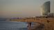 People on La Barceloneta beach in Barcelona early in the morning People on La Barceloneta beach in Barcelona early in the morning