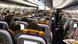 Flugreisende in einer Maschine der Lufthansa Flugreisende in einer Maschine der Lufthansa
