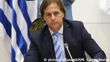 Uruguay's President Luis Lacalle Pou attends a meeting with ministers after Uruguay confirmed the first 4 cases of coronavirus in the country in Montevideo, Uruguay, Friday, March 13, 2020. (AP Photo/Matilde Campodonico) |