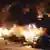 Vehicles were set alight during protests in Atlanta