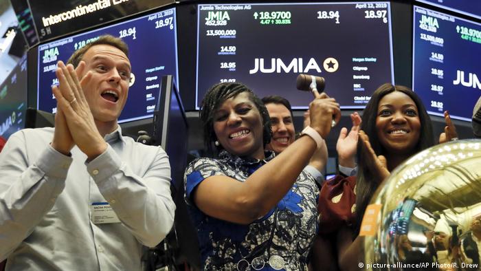 Jumia CEO Juliet Anammah (center) celebrates on the floor of the New York Stock Exchange.