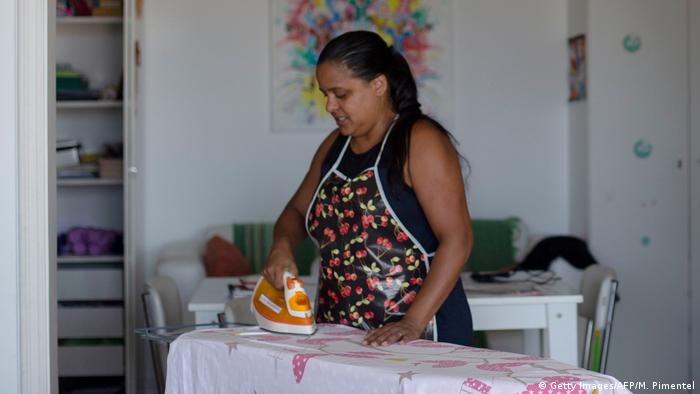 A woman ironing
