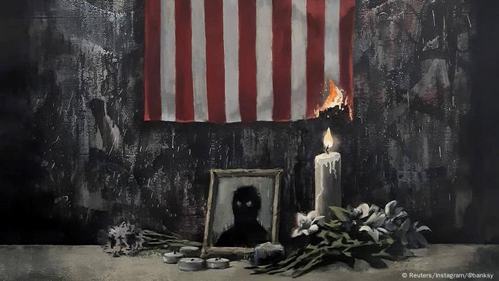 Μια αμερικάνικη σημαία που καίγεται, έργο του Μπάνκσι 