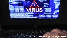 Cyberattacks research. Undated file photo of a laptop screen showing a computer virus warning. Chief executives should be held personally responsible for cyberattacks, with many users believing they should also be compensated for such breaches, new research suggests. Issue date: Monday June 8, 2020. A survey by data protection firm Veritas Technologies found that more than a third (35%) of UK consumers would see a business leader as personally responsible if a cyber breach of that business occurs. See PA story TECHNOLOGY Ransomware. Photo credit should read: Peter Byrne/PA Wire URN:54058693 |