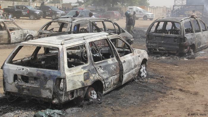 Burned-out cars after an attack in Borno State, Nigeria