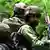 عسکریت پسندوں کے خلاف بھارتی سکیورٹی فورسز کی بدھ کے روز شروع ہونے والی کارروائی جمعرات کے دن آخری اطلاعات ملنے تک جاری تھی