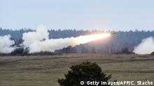 4.3.2020, Grafenwöhr, Deutschland, A Multiple Launch Rocket System (MLRS) shoots during an artillery live fire event by the US Army Europe's 41st Field Artillery Brigade at the military training area in Grafenwoehr, southern Germany, on March 4, 2020. - The 41st Field Artillery Brigade plans, prepares, executes and assesses operations to provide US Army Europe with long-range precision strike capabilities. (Photo by Christof STACHE / AFP) (Photo by CHRISTOF STACHE/AFP via Getty Images)