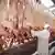 Slaughtered pigs hang in the refrigerator at the Tönnies meat processing plant. 