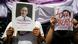 Activists hold up pictures of abducted Thai activist Wanchalearm Satsaksit as people gather in support of him during a protest calling for an investigation, in front of the Government house in Bangkok Activists hold up pictures of abducted Thai activist Wanchalearm Satsaksit as people gather in support of him during a protest calling for an investigation, in front of the Government house in Bangkok
