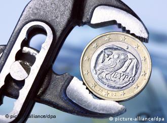 EU coin in vice-grip