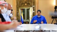 HANDOUT - 01.06.2020, Venezuela, Caracas: Nicolas Maduro (M), Präsident von Venezuela, nimmt an einer Videokonferenz teil. Venezuelas Präsident plant einen Besuch im Iran. (zu dpa Maduro will für Abkommen in Iran reisen) Foto: Jhonn Zerpa/Prensa Miraflores/dpa - ACHTUNG: Nur zur redaktionellen Verwendung im Zusammenhang mit der aktuellen Berichterstattung und nur mit vollständiger Nennung des vorstehenden Credits +++ dpa-Bildfunk +++ | Verwendung weltweit