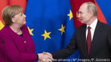 German Chancellor Angela Merkel and Russian President Vladimir Putin shake hands after their joint news conference following their talks in the Kremlin in Moscow, Russia, Saturday, Jan. 11, 2020. Merkel visits Moscow to discuss current international issues such as the situation in Syria, Libya, Ukraine, US-Iran tensions, as well as bilateral relations. (AP Photo/Pavel Golovkin, Pool) |