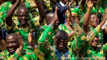 Supporters of Burundi's President elect Evariste Ndayishimiye cheer as they attend his inauguration ceremony following the sudden death of his predecessor Pierre Nkurunziza, amid the growing threat of the coronavirus disease (COVID-19), at the Ingoma stadium in Gitega, Burundi June 18, 2020. REUTERS/Evrard Ngendakumana