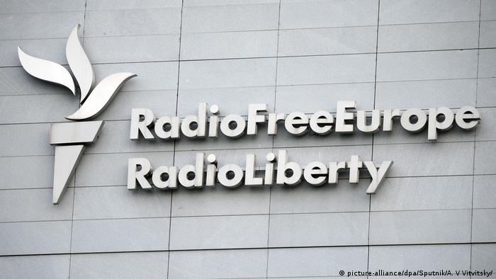 Signboard on the headquarters building of Radio Free Europe / Radio Liberty international organization in Prague.