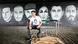 Cetin Gültekin, a brother of one of the victims of the Hanau attack, in front of a mural showing the victims Cetin Gültekin, a brother of one of the victims of the Hanau attack, in front of a mural showing the victims