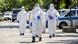 German health workers in full protective gear German health workers in full protective gear