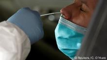 A medical worker administers a test for the coronavirus disease (COVID-19) at United Memorial Medical Center amid the global outbreak of the coronavirus disease (COVID-19), in Houston, Texas, U.S., June 23, 2020. REUTERS/Callaghan O'Hare
