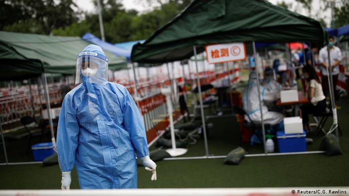 China puts 500,000 in lockdown as coronavirus cases rise again