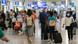 Passengers seen with the obligatory face masks at Athens International Airport in mid-June Passengers seen with the obligatory face masks at Athens International Airport in mid-June