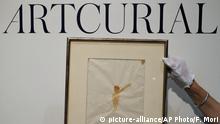 A watercolor painting of The Little Prince by Antoine de Saint Exupery is presented at Artcurial Auction house in Paris, France, Tuesday, May 31, 2016. It was sold to an anonymous European collector at auction for 133,200 euros or 148,298 U.S dollar. (AP Photo/Francois Mori) |
