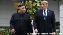 FILE - In this Feb. 28, 2019 file photo, President Donald Trump and North Korean leader Kim Jong Un take a walk after their first meeting at the Sofitel Legend Metropole Hanoi hotel, in Hanoi. John Bolton, President Donald Trump’s national security adviser, says North Korean allegations that he and Secretary of State Mike Pompeo created an atmosphere of hostility and mistrust at last month’s nuclear summit in Hanoi are “inaccurate.” North Korea’s Vice Foreign Minister Choe Son Hui said Friday that Trump was willing to talk, but was influenced by uncompromising demands by Pompeo and Bolton. She says the “gangster-like stand of the U.S. will eventually put the situation in danger.”
(AP Photo/Evan Vucci) |