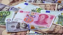 ©Kyodo/MAXPPP - 01/12/2015 ; Photo taken Nov. 30, 2015, shows Chinese 100 yuan bills, 100 euro bills, U.S. 100 dollar bills and Japanese 10,000 yen bills. The International Monetary Fund decided that day to add the yuan to its benchmark currency basket starting in October 2016. (Kyodo) ==Kyodo |