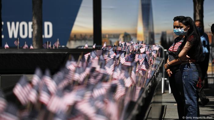 People gather at the 9/11 Memorial Plaza in New York City. People gather at the 9/11 Memorial Plaza in New York City.