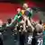 Fara pemain Werder Bremen merayakan kemenangan di stadion kosong