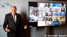 Germany's Interior Minister Horst Seehofer poses for a group picture during a virtual meeting with European justice and home affairs ministers during Germany's EU council presidency, following the outbreak of the coronavirus disease (COVID-19) in Berlin, Germany July 7, 2020. REUTERS/Fabrizio Bensch/Pool