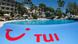 Эмблема TUI, бассейн и гостиница в Испании Эмблема TUI, бассейн и гостиница в Испании