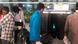 Passengers at a baggage scanner in New Delhi Passengers at a baggage scanner in New Delhi