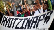 FILE PHOTO: Students participate in a march in Mexico City to mark the 65th month since the disappearance of the 43 missing Ayotzinapa College Raul Isidro Burgos students in the state of Guerrero, Mexico, February 26, 2020. REUTERS/Edgard Garrido/File Photo