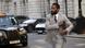 Film still 'Tenet'; John David Washington in a grey suit Film still 'Tenet'; John David Washington in a grey suit