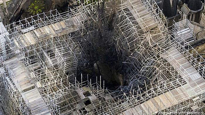 Aerial shot of the fire damage to the area where the spire was on Notre Dame cathedral in Paris
