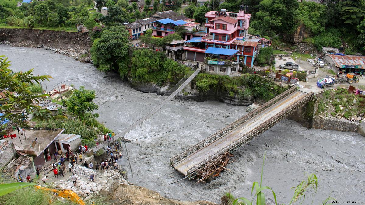 Floods and landslides lash Nepal, scores dead