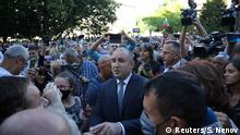 Bulgarian President Rumen Radev (C) talks to supporters at a demonstration after prosecutors raided Bulgarian president's offices as part of investigations, in Sofia, Bulgaria, July 9, 2020. REUTERS/Stoyan Nenov