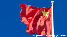 FILE - The Chinese flag waves during the welcoming of German Chancellor Angela Merkel in Beijing, China, 29 October 2015. Photo: SOEREN STACHE/dpa (zu dpa China - neue Großmacht ohne Freunde? vom 29.12.2015) +++(c) dpa - Bildfunk+++ | Verwendung weltweit