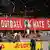 Freiburg ultras display a choreography with the message "Love football, hate sexism"