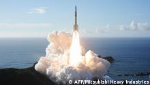 In this handout photograph taken and released on July 20, 2020 by Mitsubishi Heavy Industries an H-2A rocket carrying the Hope Probe known as Al-Amal in Arabic, developed by the Mohammed Bin Rashid Space Centre (MBRSC) in the United Arab Emirates (UAE) to explore Mars, blasts off from Tanegashima Space Centre in southwestern Japan. - The first Arab space mission to Mars blasted off on July 20 aboard a rocket from Japan, with the probe dubbed Hope successfully separating about an hour after liftoff. (Photo by Handout / Mitsubishi Heavy Industries / AFP) / --- RESTRICTED TO EDITORIAL USE - MANDATORY CREDIT AFP PHOTO / (MITSUBISHI HEAVY INDUSTRIES) - NO MARKETING NO ADVERTISING CAMPAIGNS - DISTRIBUTED AS A SERVICE TO CLIENTS ---